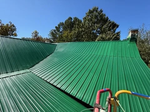 Metal roof after protective green coating